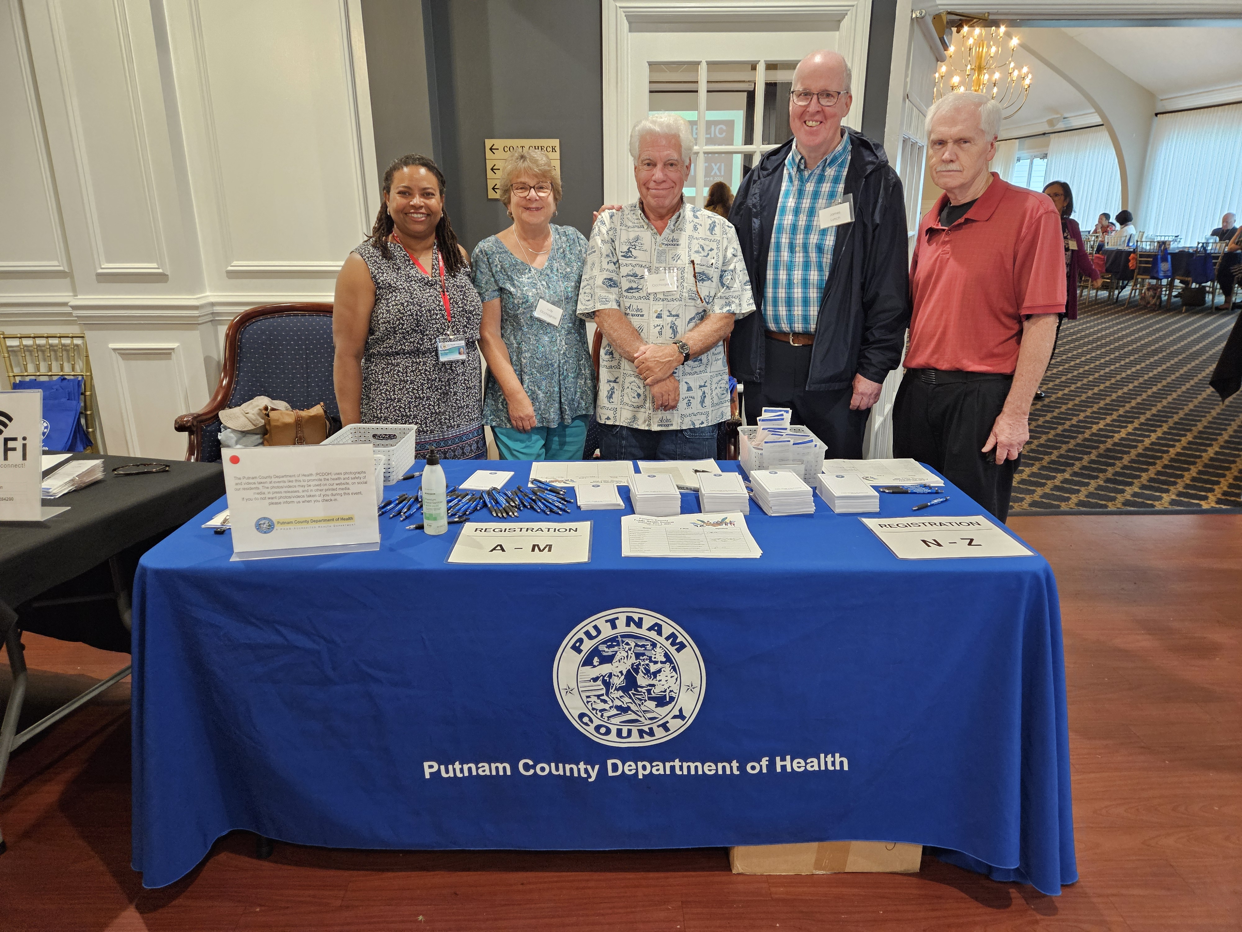 Medical Reserve Corps volunteers connect with the health department throughout the year, providing needed support at a variety of events, including Public Health Summit XI. From left are Carla Taylor, the new MRC assistant, husband and wife volunteers Judy and Joe Occhiogrossi; James Lynch, RN, and John Ohnmacht.